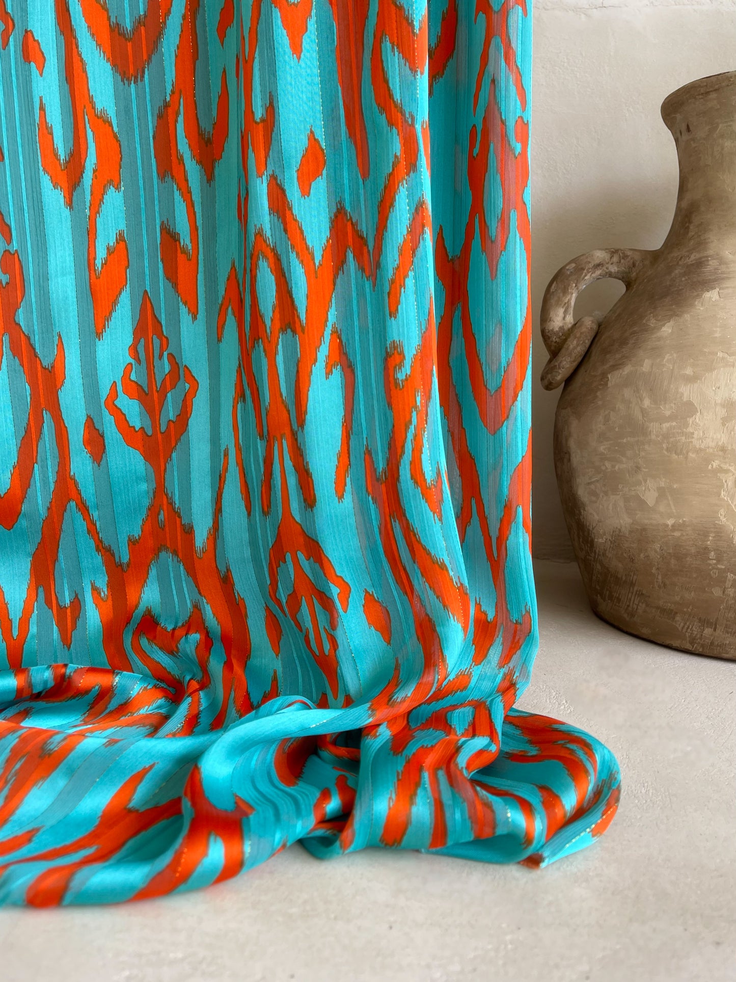 Tela Gasa Texturizada Turquesa con Naranja y Lurex Dorado