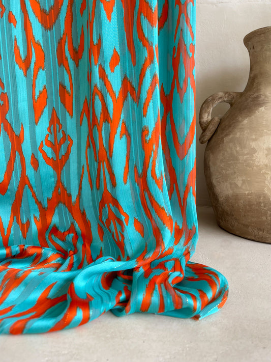 Tela Gasa Texturizada Turquesa con Naranja y Lurex Dorado